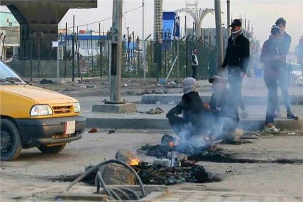 محتجون يغلقون حقل الناصرية النفطي في جنوب العراق