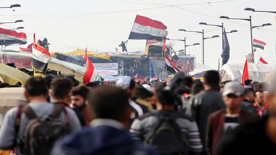 العراقيون يحيون ذكرى “ثورة تشرين” في بغداد وسط إجراءات أمنية مشددة